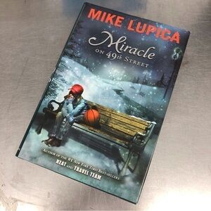 Miracle on 49th Street by: Mike Lupica, hardcover book
